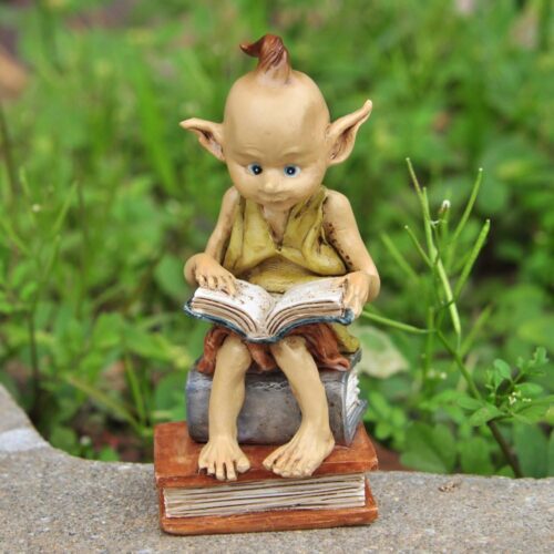 garden pixie elf reading book