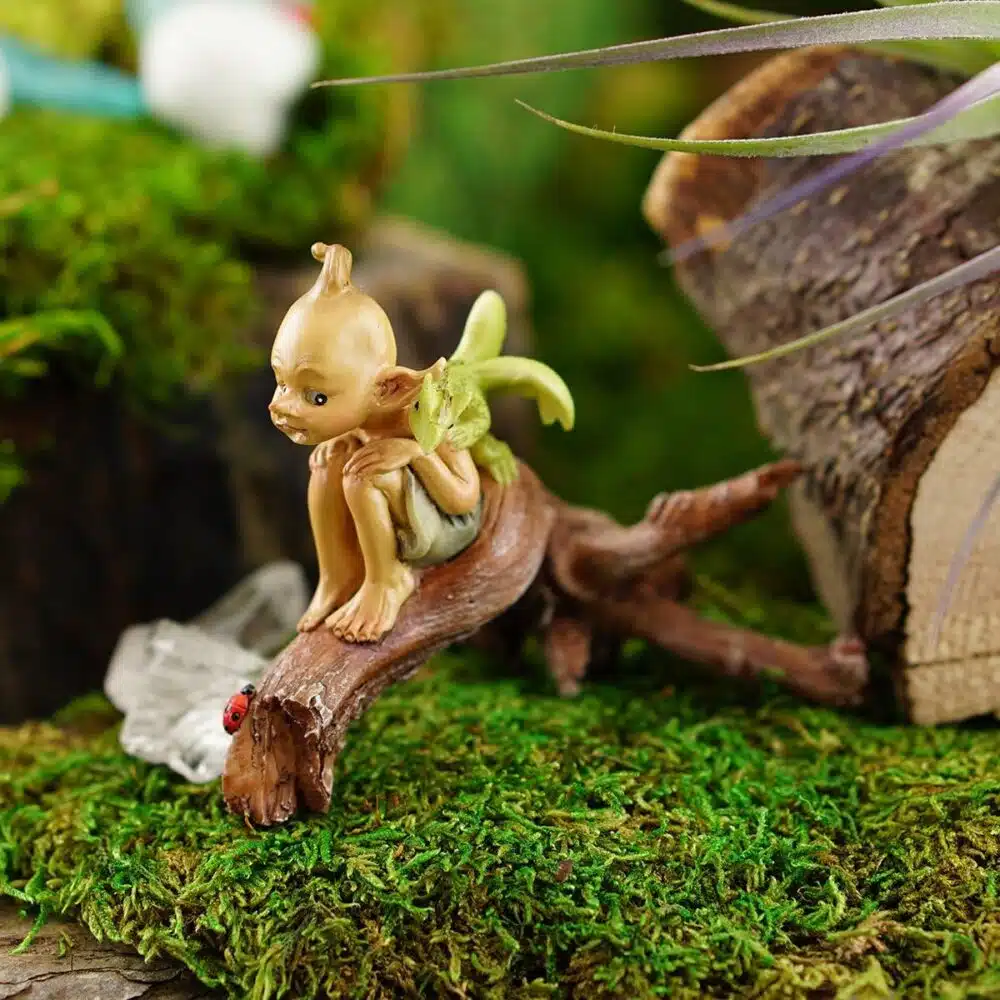 top collection miniature garden pixie with baby dragon on branch