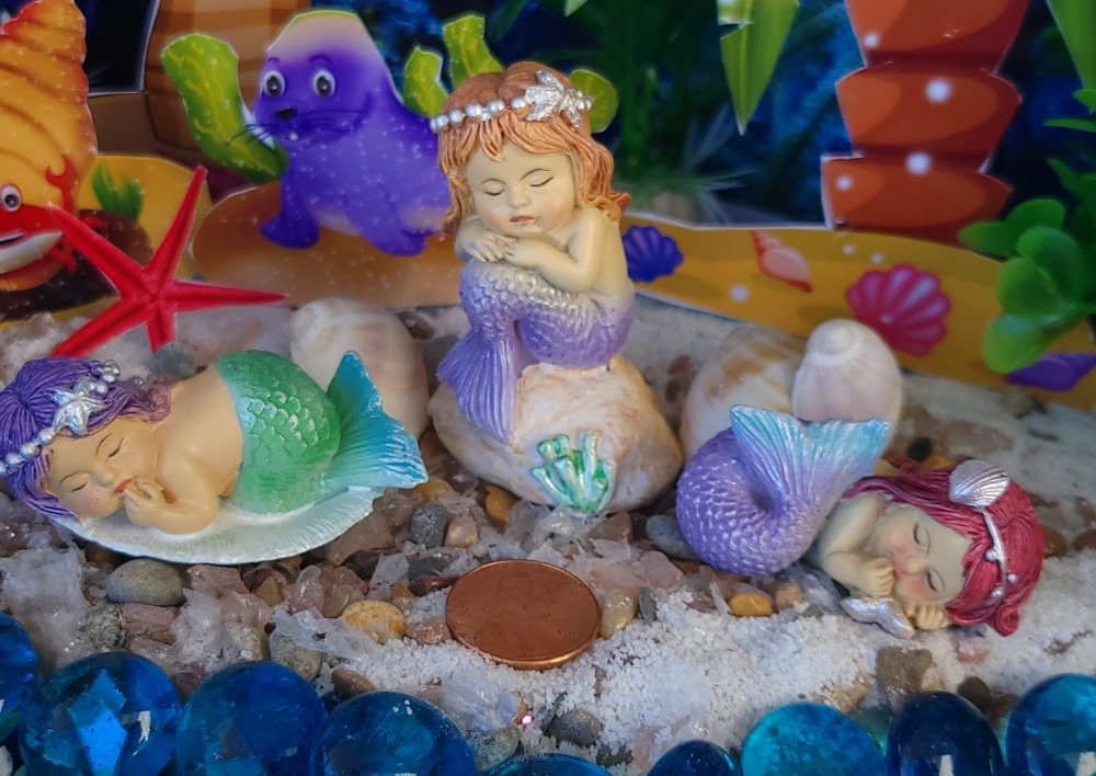 adorable sleeping little mermaids