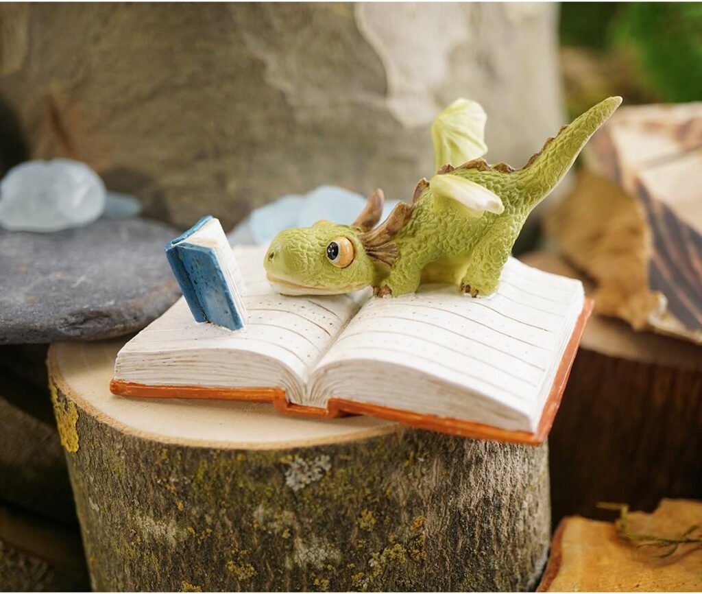 mini green dragon reading figurine