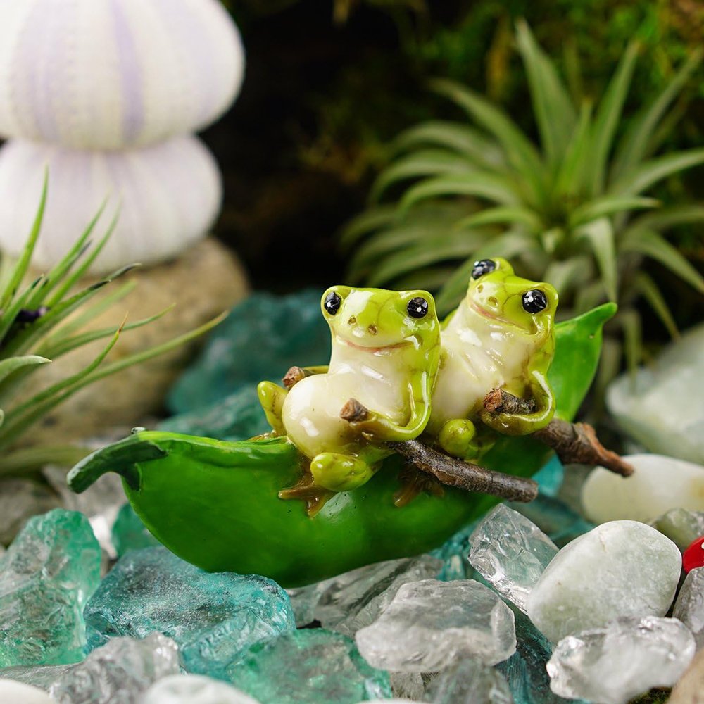 frogs setting sail in a magical pea pod boat2